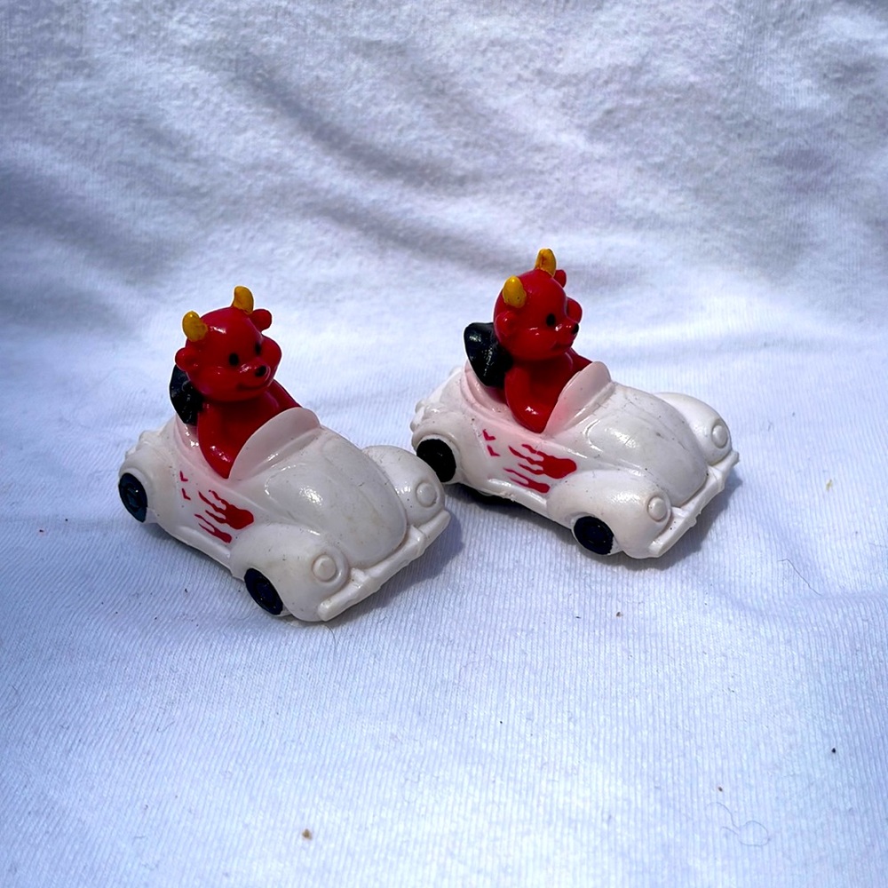 Russ Red Devil in white car